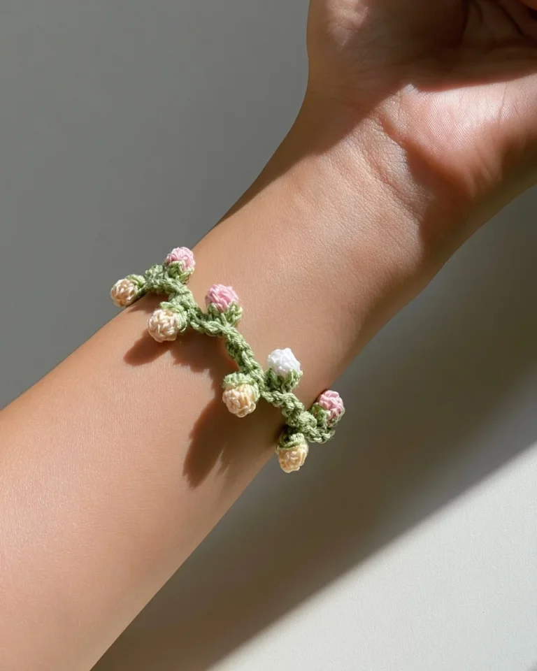 Delicate crochet tulip bud bracelet showcasing floral DIY jewelry design