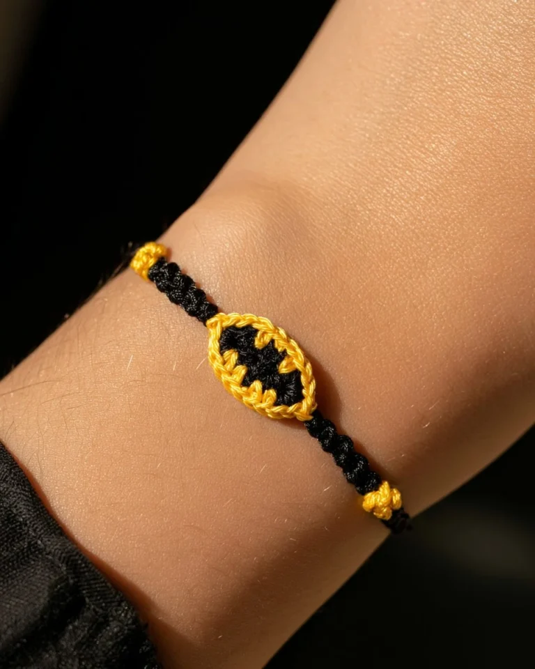 DIY crochet Batman bracelet tutorial showcasing colorful yarn and crochet technique.