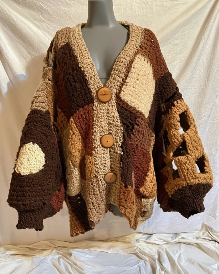 Handmade brown patchwork cardigan showcasing intricate knitwear design