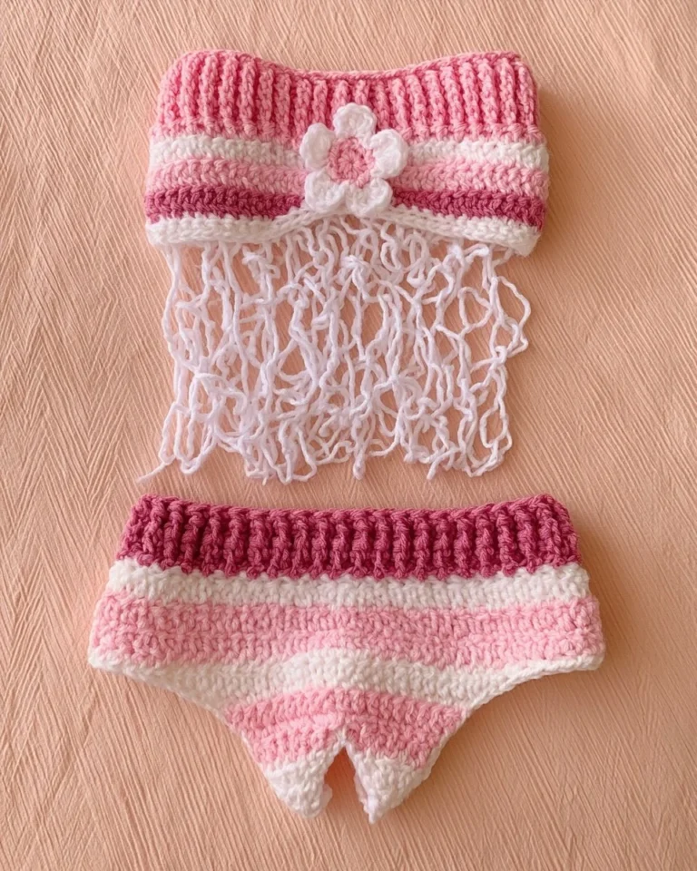 Pink handmade crochet set featuring unique handcrafted accessories.