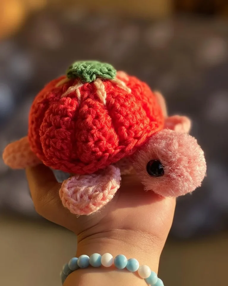 Strawberry sea turtle crochet plush handmade toy in vibrant colors
